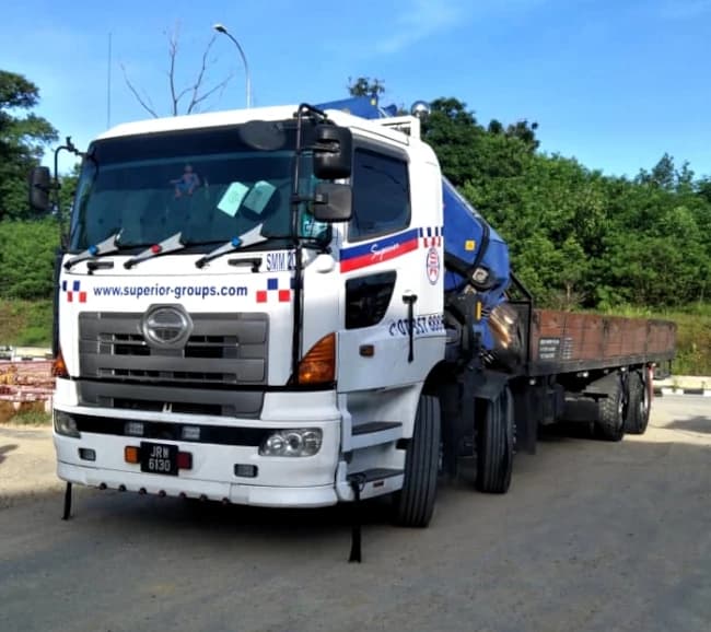 Lorry crane rental positioning equipment inside a data center in Johor